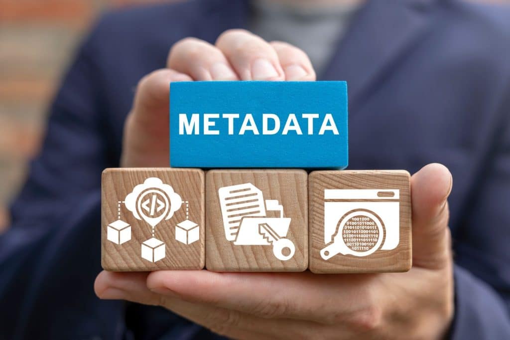 A photo showing a person adding metadata to a business website for SEO optimization tips.