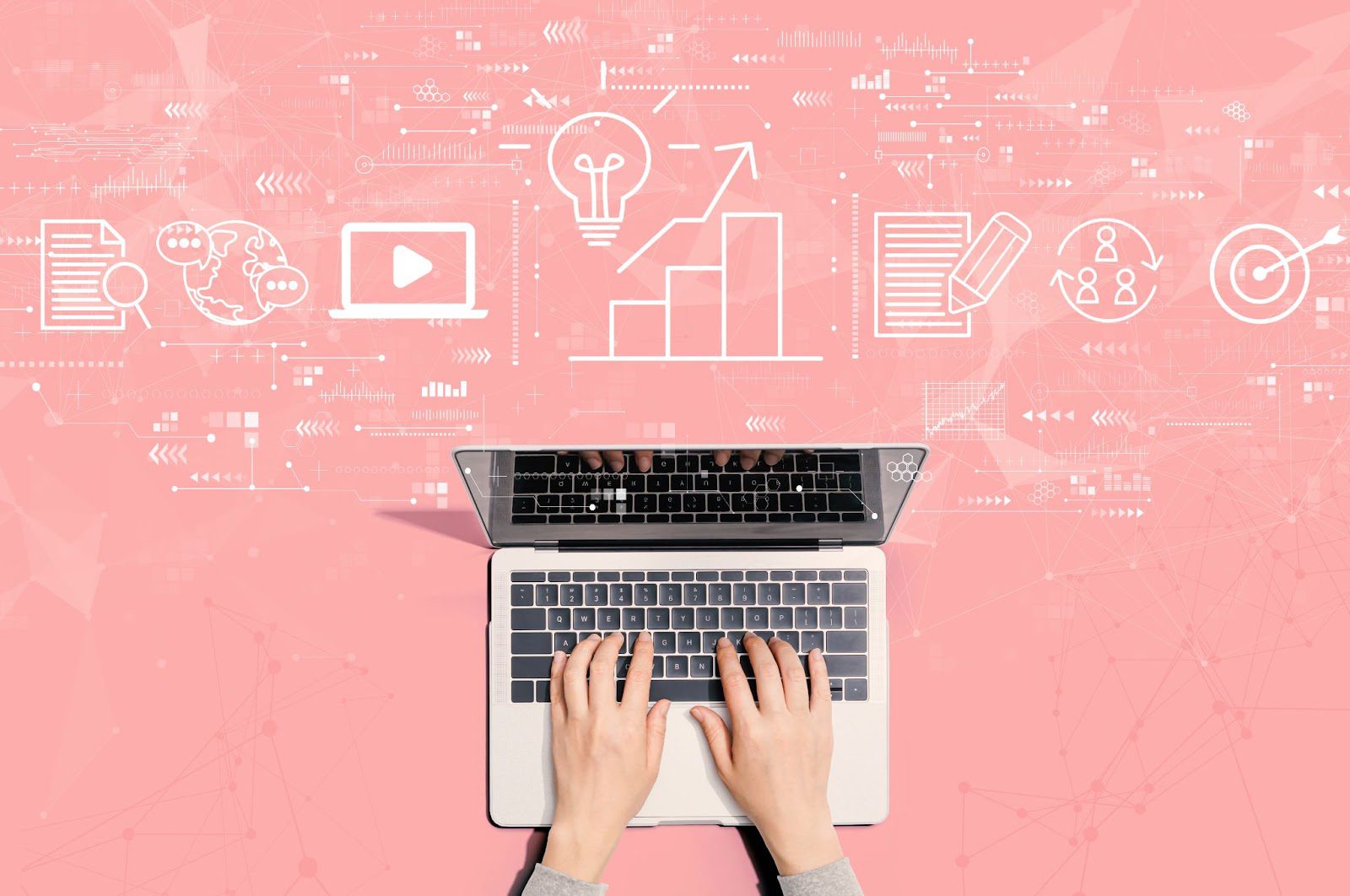 Hands typing on a laptop with digital icons representing ideas, growth, and connectivity on a pink background.