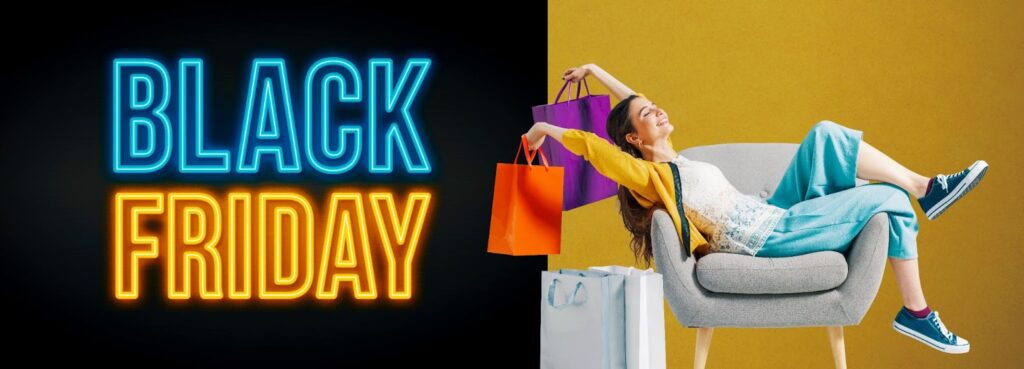 Woman relaxing on a chair with shopping bags, next to BLACK FRIDAY neon sign.
