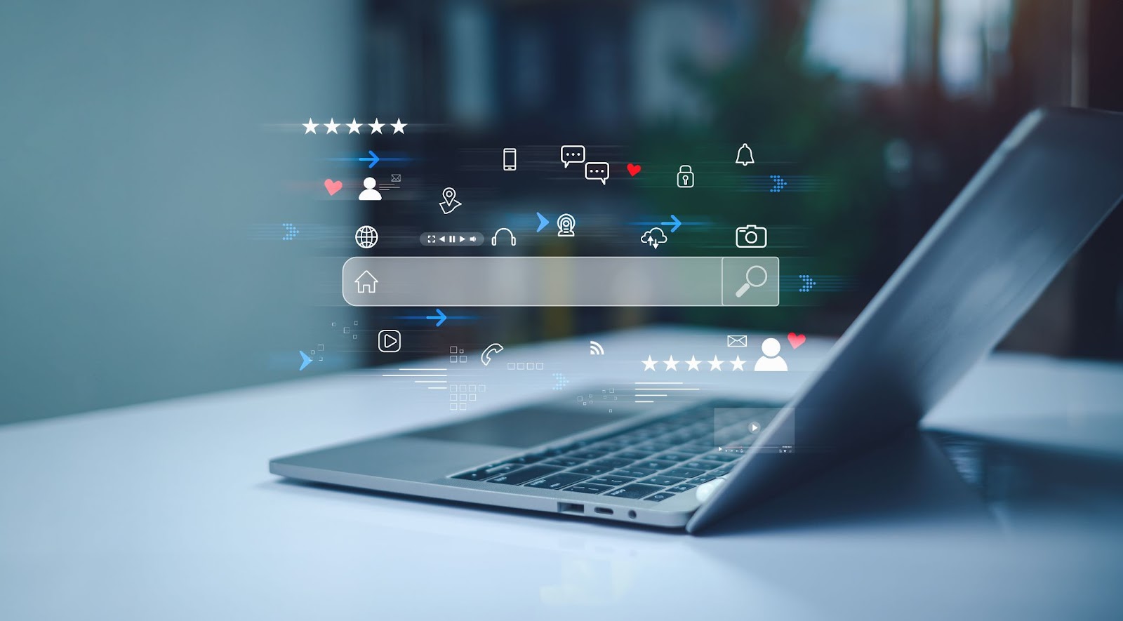 A side-view of a laptop on a white desk features a floating, transparent search bar and various digital icons representing social media, location, and multimedia.